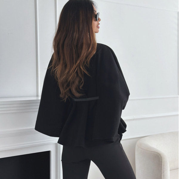 veste à col montant et manches chauve-souris avec ceinture