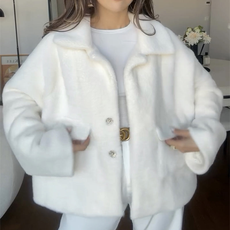Manteau fourrure à simple boutonnage et revers larges pour les femmes